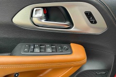 Driver-Door-Controls-Top-Stitching
