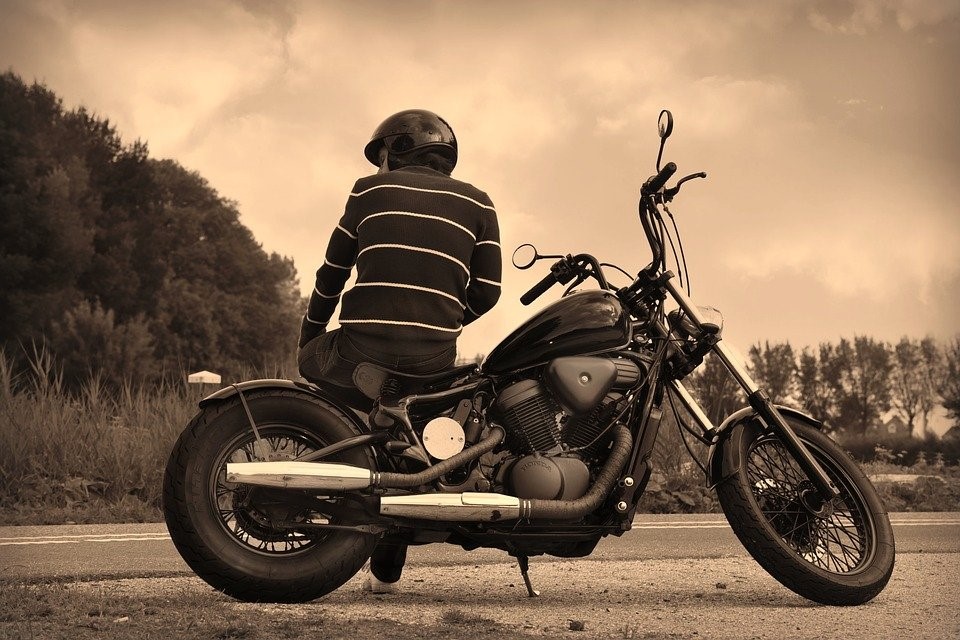First Motorcycle; https://pixabay.com/photos/guy-motorbike-biker-parked-sitting-3639100/