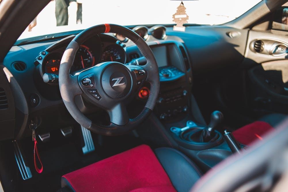 must-have safety technology; https://www.pexels.com/photo/black-interior-of-modern-car-5120114/