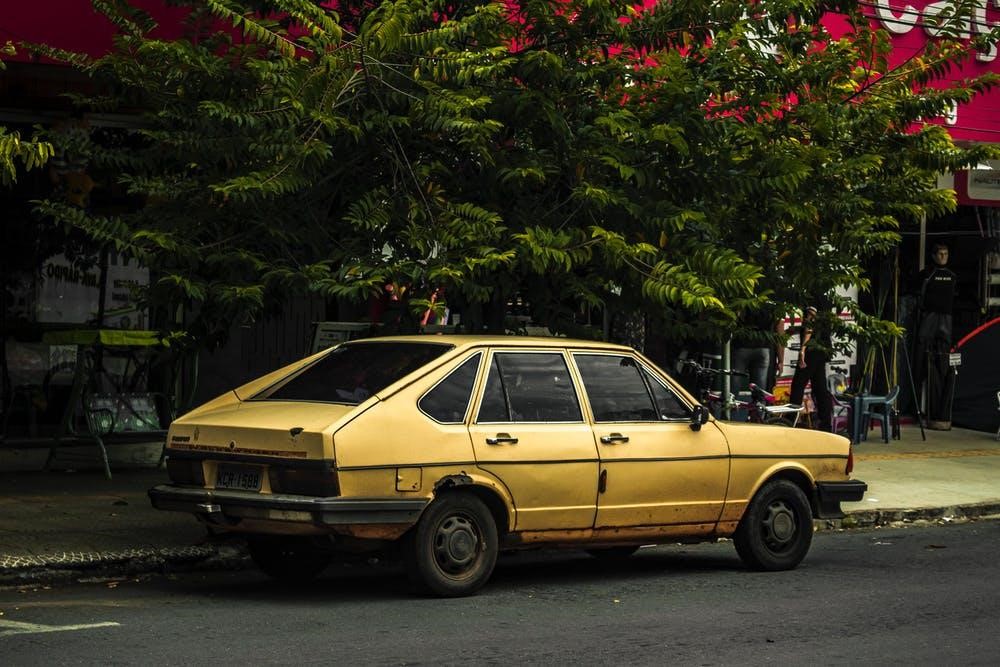 old car, https://www.pexels.com/photo/yellow-sedan-parked-2116156/