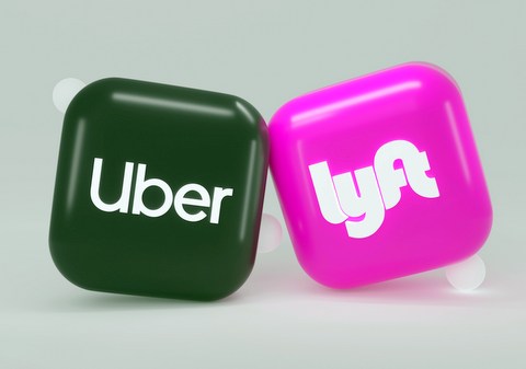 Uber Lyft logos; Photo by Mariia Shalabaieva on Unsplash