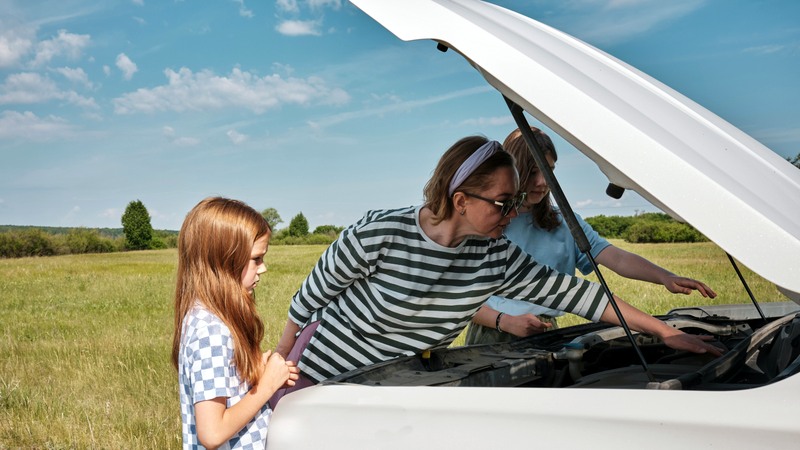 car care guide, familiarize yourself with car basics, https://unsplash.com/plus?referrer=%2Fphotos%2Fa-woman-and-a-little-girl-looking-under-the-hood-of-a-car-1vUsIIvU1Dw