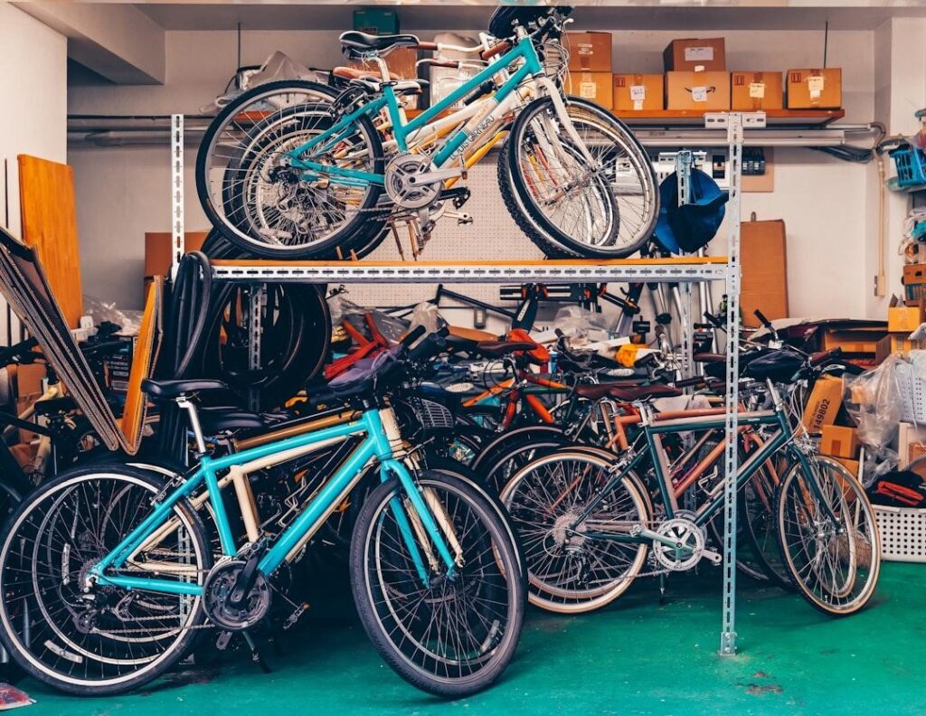 Row of new bicycles displayed for sale inside a bright bike shop