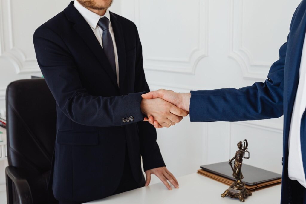 Image source: https://www.pexels.com/photo/hand-shake-of-two-men-7875996/